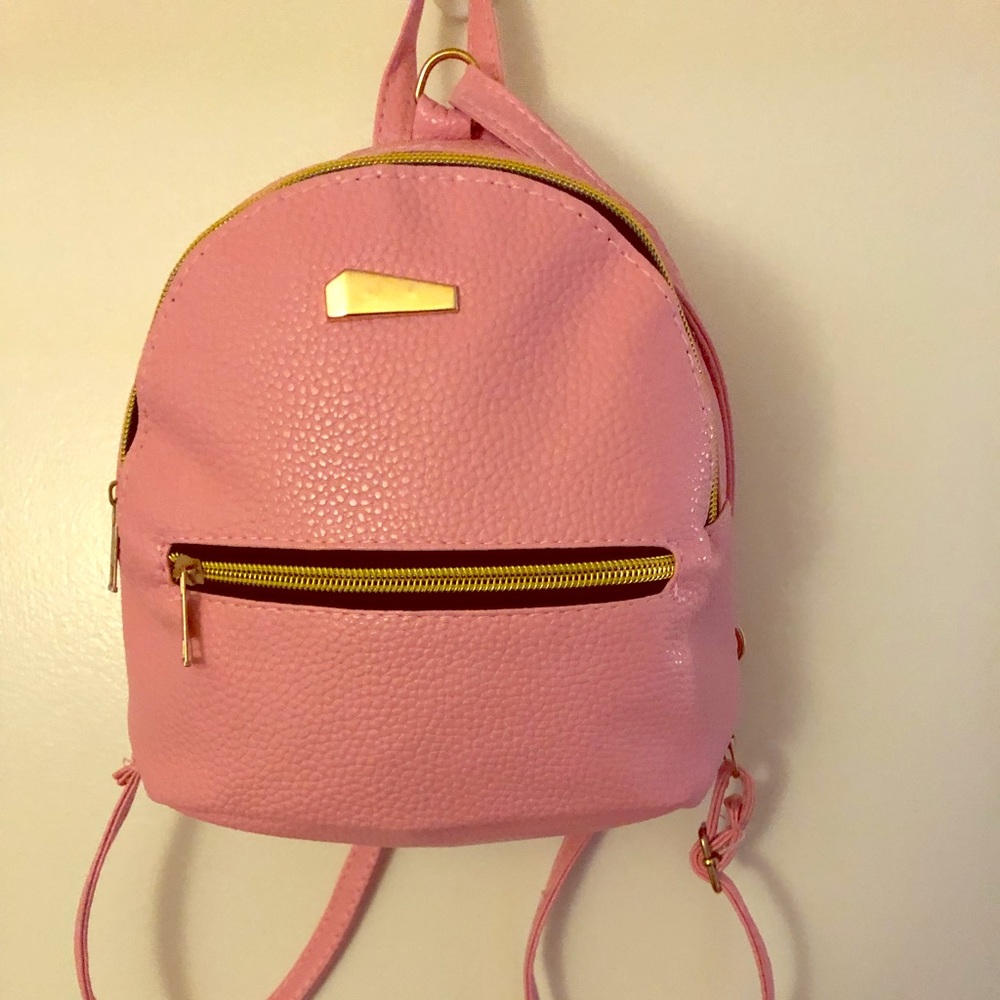 Mini Backpack pink color brand new without tags.